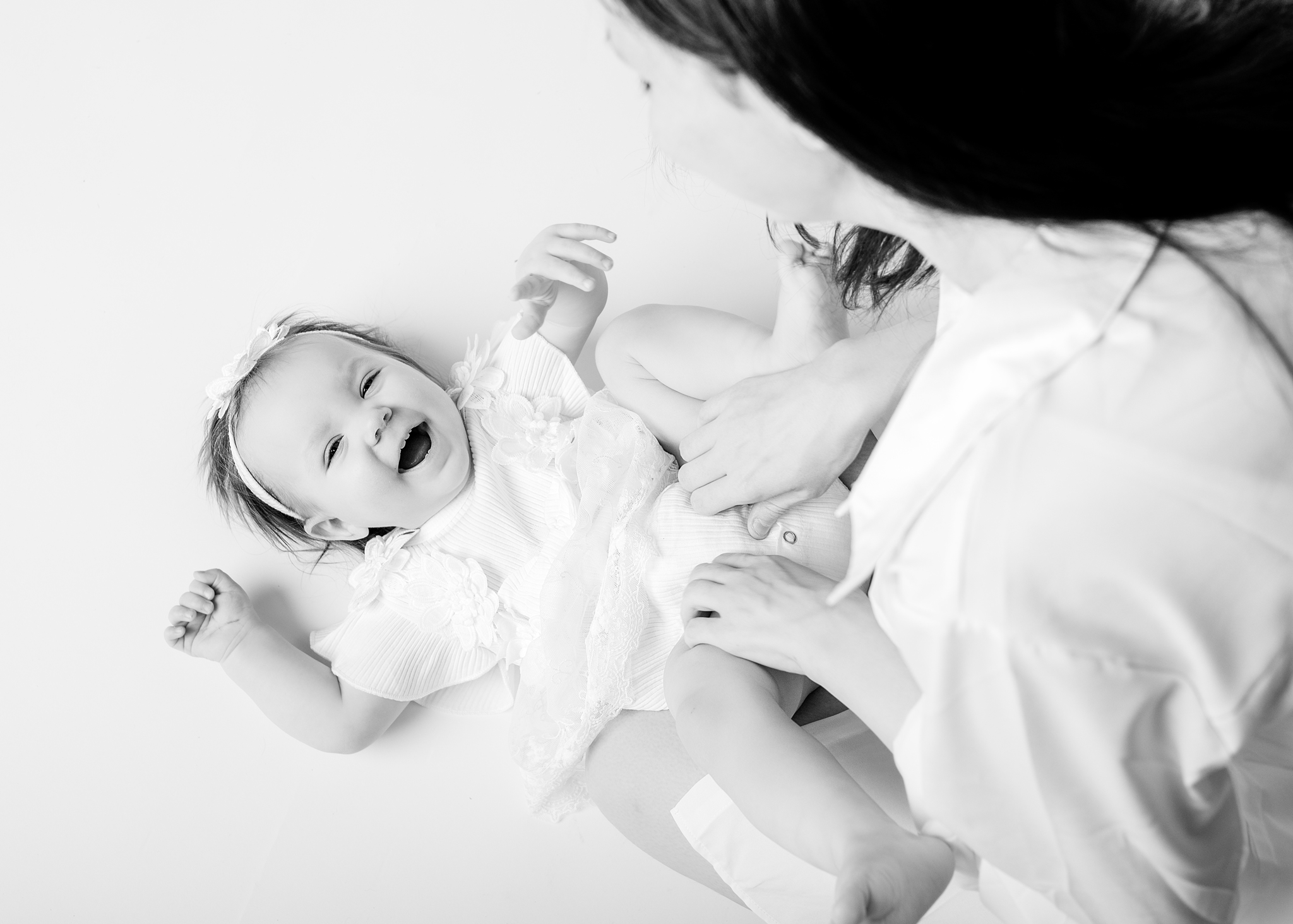 Mother enjoying a relaxed portrait moment with her baby