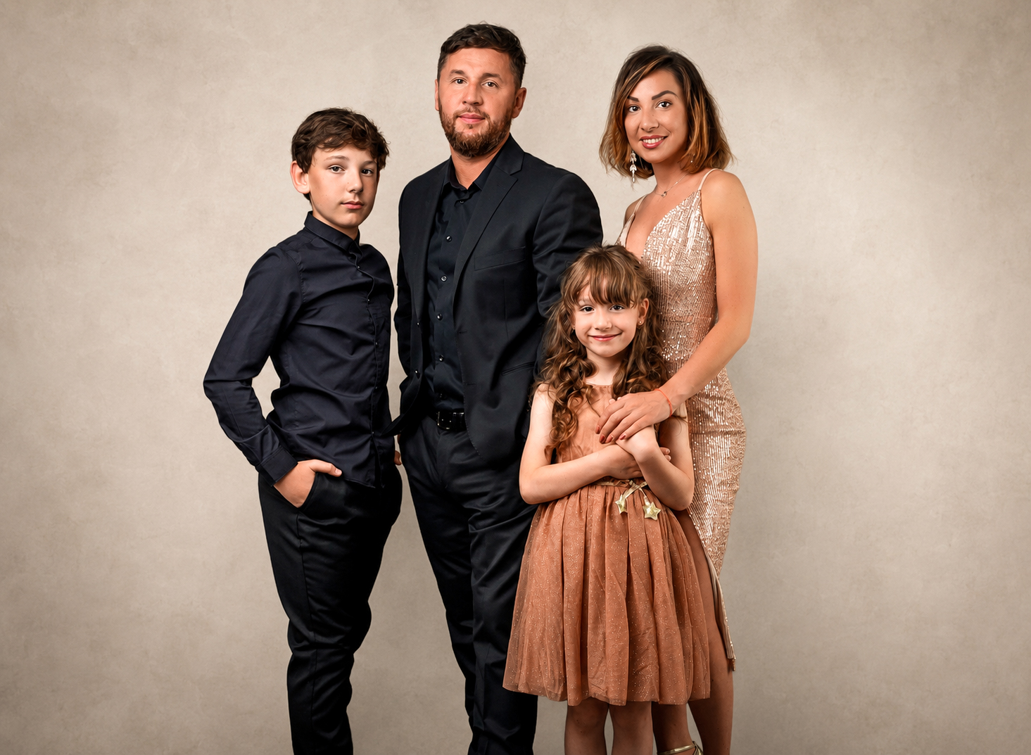 Studio family portrait with parents and two children